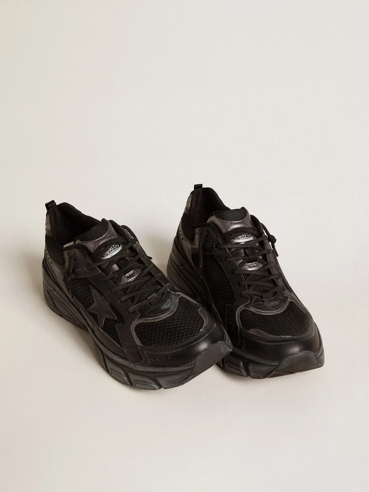 Womens Lightstar with black leather and mesh upper and black star